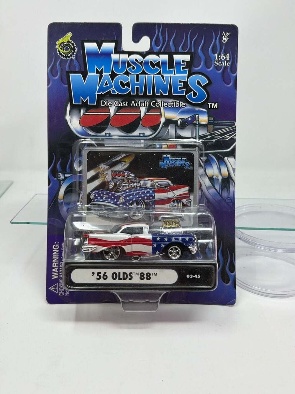 Muscle Machines '56 Olds 88 Diecast Car Stars and Stripes 1:64
